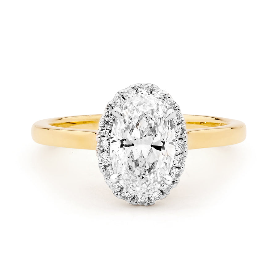 Oval cut diamond ring with halo