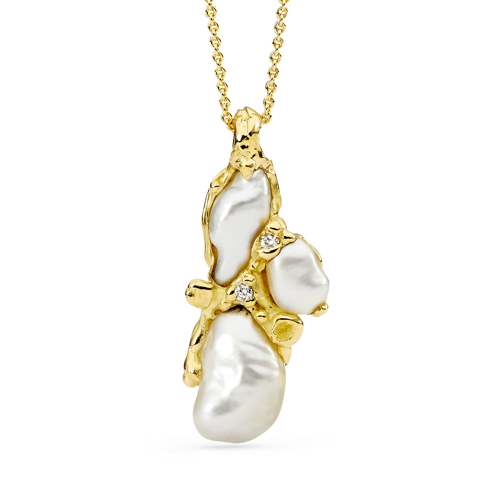 Textured yellow gold baroque pearl pendant with diamonds