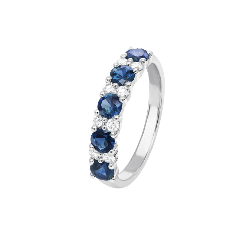 Sapphire and white diamond claw set ring