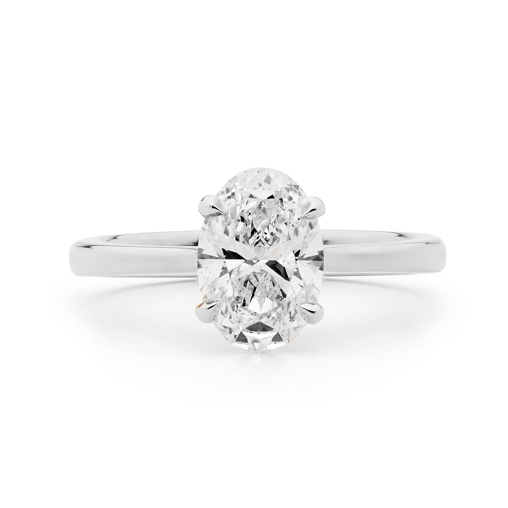 Two Tone Oval Cut Diamond Solitaire Ring
