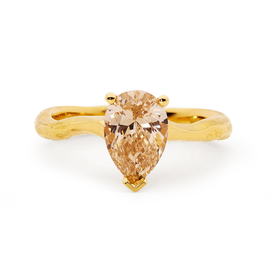 Pear cut champagne diamond solitaire ring